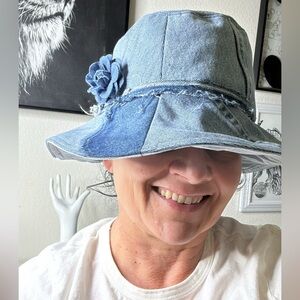 Women's Denim Bucket Hat with Floral Accent in Blue